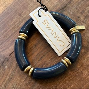 Canvas bracelet navy with gold. Tags on